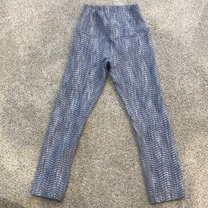 Gray and white lululemon capri pants size 4